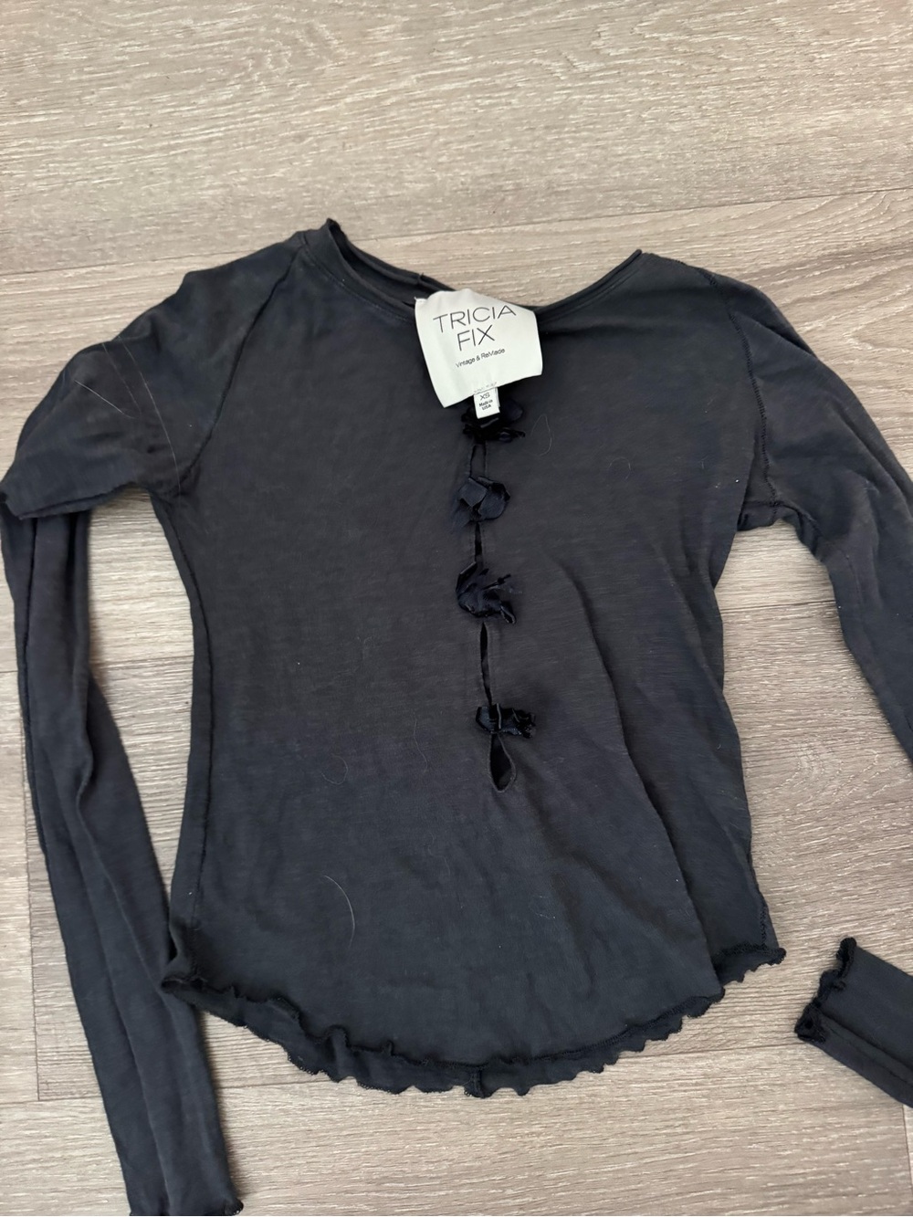 Tricia Fix Black Long Sleeve Tie-Front Ruffle Hem Top